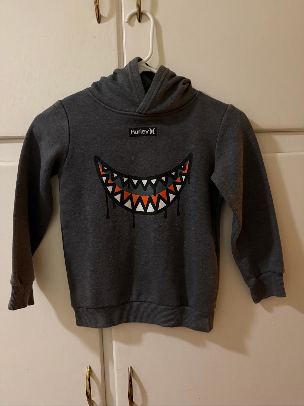 Hurley Dark Gray Boys Hoodie with Orange & White Smile Graphic